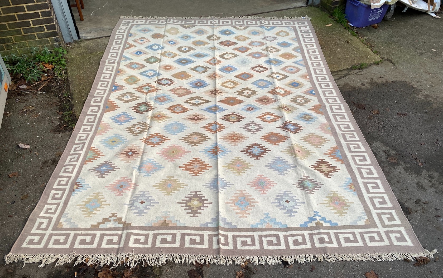 A Kilim Dhurrie polychrome flatweave carpet, approximately 360 x 280cm